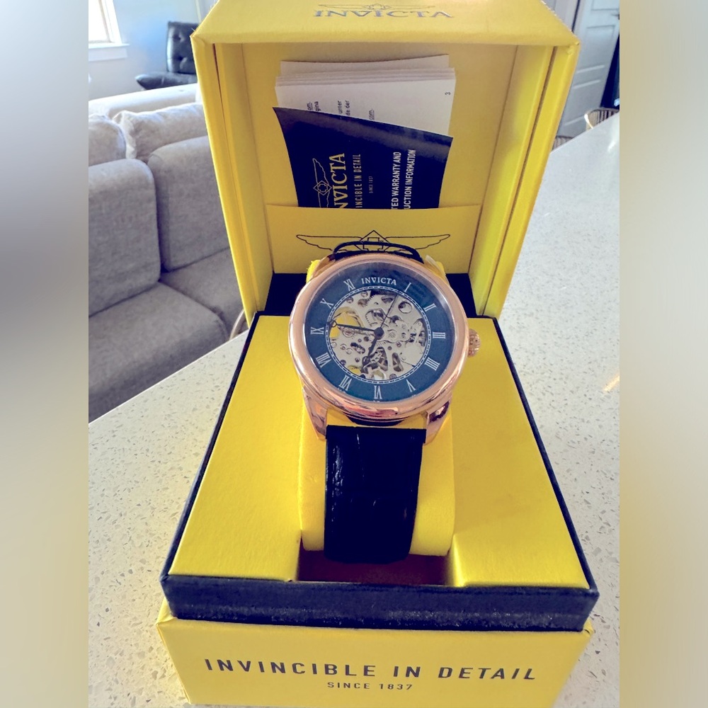 Invicta Men's Black and Gold Watch